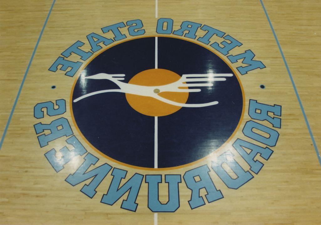 Metro State Roadrunners logo on a gym floor