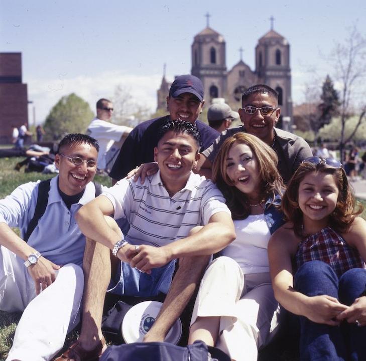 Students smiling in the sun on Auraria Campus