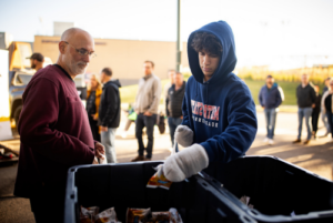 MSU Denver athlete volunteering with Food for Thought.